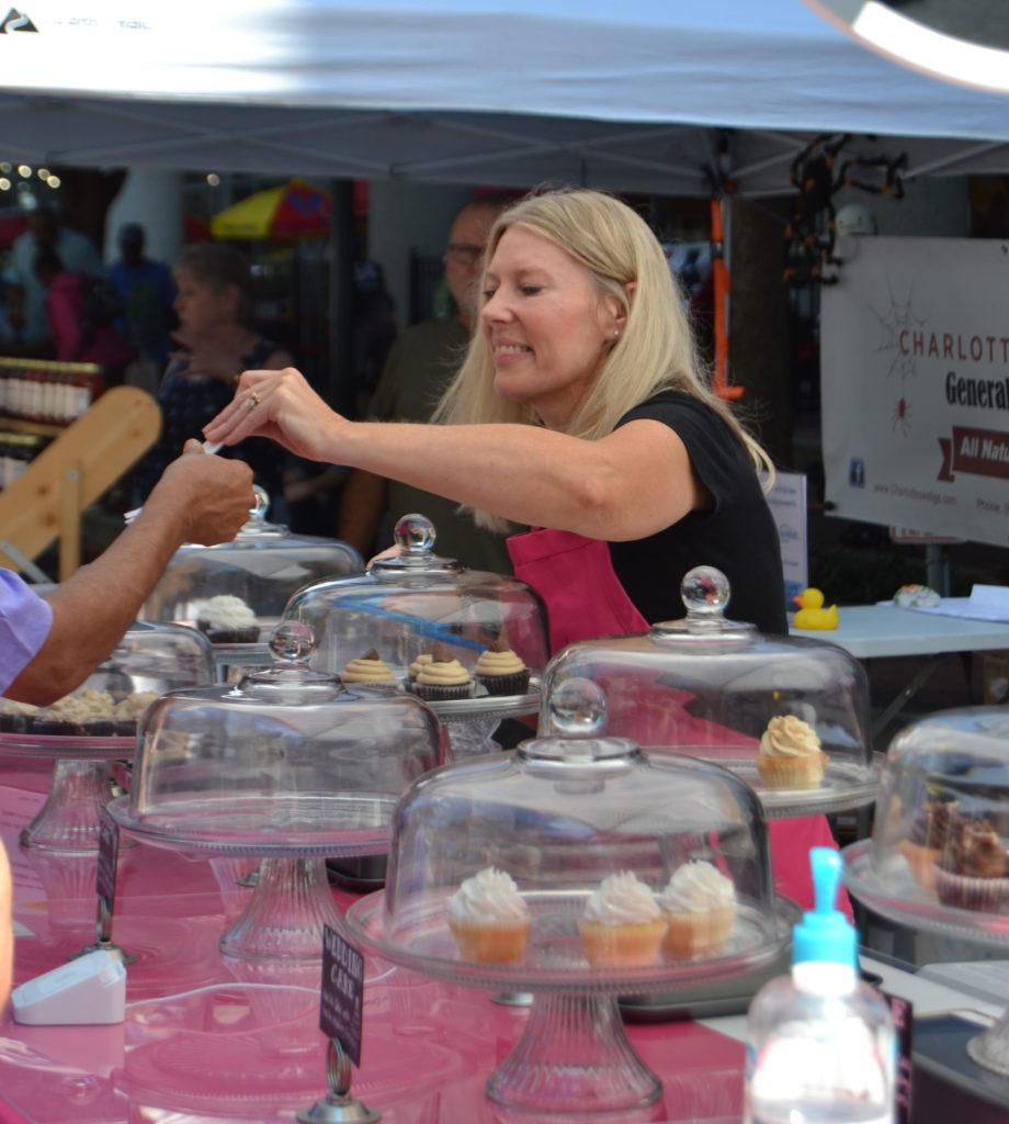 Serving fresh cupcakes at Soda City Market
